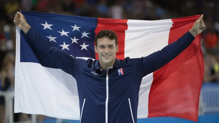 Léon Marchand won the 4th Olympic swimming gold, which triggered the celebration across Paris